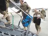 Alaska Air National Guardsmen of the 176th Wing board a C-17 Globemaster III Sept. 26, 2017, at Joint Base Elmendorf-Richardson, Alaska, bound for a deployment to Southwest Asia in support of