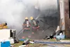 Firefighters with the Houston Volunteer Fire Department put water on a house fire on N. Moose Meadows Road Thursday morning. ROBERT DeBERRY/Frontiersman.com