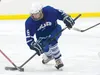 Palmer’s Luke Wright battles for the puck last season. Wright is a senior this season, and is expected to be a leader on the Palmer squad. ROBERT DeBERRY/Frontiersman