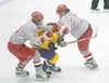 ROBERT DeBERRY/Frontiersman Wasilla's Dylan Troisi and Jordan
Elkins collide at mid-ice with Lathrop Malmute Alec Hajdukovich
during Thusday's game at the Fourth Annual Curtis C. Menard II
Me