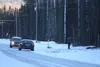 An investigator with the Alaska State Troopers takes a photograph at the scene of a shooting that left two people dead Monday morning, Feb. 1, in the 4600 block of North Autumn Lane near Pitt