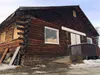 The old Willow Community Center sits beside Willow Lake on Friday, March 11, 2016. Mat-Su Borough officials say the old center must be moved by Sept. 1. MATT TUNSETH/Frontiersman.com
