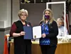 Wasilla Mayor Glenda Ledford (left) presents the city's proclamation recognizing January as National Slavery and Human Trafficking Prevention Month to Alaska Stop Human Trafficking Alliance c