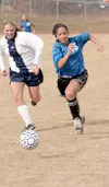 Palmer senior Alicia Berberich sprints toward the ball during
her squad's 2-0 win over Soldotna on Friday. JEREMIAH BARTZ/
Frontiersman
