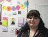 Job Corps student Gina Mayeur sits by the few but happy decorations in her dorm room — cards from mentors, photos with friends, and her own words of inspiration — on Wednesday, Oct. 28. CAITL