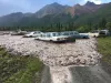 John Alexa, also known as “The Volvo Doctor,” found some reported 80 parts rigs on his property near Glacier View engulfed in goo July 6. The area’s persistent rain over recent weeks gave way