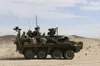 Soldiers from 2-2 Stryker Brigade Combat Team move out in their Stryker during their training rotation at the National Training Center on Fort Irwin, Calif., Sept. 2, 2019. Sgt. Ryan Barwick