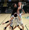 Houston's Hayden Howard works to split defenders during a double-overtime loss to Nome. Bruce Eggleston/matsusports.net