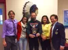 Wasilla Sunrise Rotary Club’s “Educator of the Year”, Shawn Hayes of Wasilla High School (center). Also in the photo are Assistant principal Jason Moen, Rotary youth exchange student, Maria I