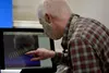 Edward Dalton, an engineer with the Defense Logistics Agency Product Test Center Analytical, rotates the 3D image of a spring produced by a new 3D scanner at a lab in Philadelphia, Oct. 14, 2