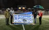 Palmer High School was presented with a painting that is more than 30 years old during halftime of the Potato Bowl Friday at Palmer High School. Courtesy of Bruce Eggleston/matsusports.net