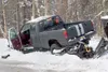 A pickup truck and snowmachine sit wrecked in the ditch off
Soapstone Road near Smith Street Saturday afternoon. The
vehicle-snowmachine accident sent a 8-year-old boy to the hospital
via Lif