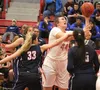 Wasilla senior Leya DePriest is surrounded by a crowd of Coronado Cougars during the second day of the 2015 Doc Larson’s Roundball Classic. DePriest is an example of the Division I talent tha
