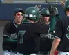 Colony baserunner Kody Ziter is greeted at home plate after his
grand slam against West Valley in the first inning of their Alaska
State Baseball Tournament on Thursday, June 5, 2008, at Grow
