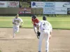 ROBERT DeBERRY/Frontiersman Mat-Su infielder Ryan Ford runs down
Athletes in Action Fire’s Colby Braddock during Friday’s game at
Hermon Brothers Field in Palmer. Robert DeBerry