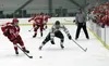 With Colony forward Jake Hessinger in pursuit, Wasilla defenseman Austin Stephens looks to move the puck away during Wasilla's 4-3 win over the Knights Tuesday, Nov. 15, 2016, at the Menard A