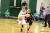 Kenai's Hannah Drury tries to reach and knock the ball away from Colony's Haylee Duguid during Colony's 46-32 win over the Kardinals Jan. 8 at Colony High School. Courtesy Bruce Eggleston/mat