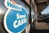 Hostess window stickers and ‘for lease’ signs decorate the windows at the Wonder Bread Hostess Outlet store in Wasilla. ROBERT DeBERRY/Frontiersman.com