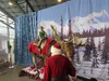 Owen Beegle, 7, gets his picture taken with Santa at the Alaska Vintage Market. Jacob Mann/Frontiersman