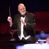 Mat-Su Concert Band conductor Gleo Huyck.