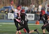 Houston quarterback Paul Sanderlin throws the ball while under pressure against Eielson during the ASAA First National Bowl small-schools state tltle game Saturday at Palmer High School. Jere