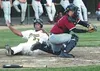 Jase Turner slides safely around the tag of California catcher
Brian Capon during the Miners' 6-1 victory on opening night. Photo
by JEREMIAH BARTZ/Frontiersman.