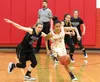 Palmer's Kaylee King and Wasilla's Olivia Davies chase a loose ball during Wasilla's 62-17 win over the Moose Feb. 16, 2016. Courtesy Bruce Eggleston/matsusports.net