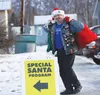 Toby Prescott with the Christian Motorcycle Association Midnight Son Riders Chapter 801 delivers bags of wooden toys made by prisoners at the Palmer Correctional Center to the Mat-Su Special 