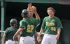 Mat-Su Miners catcher Josh Meyer, left, and pitcher Tyler Stubblefield (50) congratulate Miners outfielder Cameron Frost (22) after Frost scored the game-winning run during a 1-0 win over the