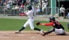 Mat-Su's Chase Wilcox drives a pitch into the field. Jeremiah Bartz/Frontiersman