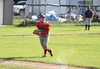 Wasilla pitcher Koby Burns fields a ground ball and makes the throw to first during a 5-4 loss to Kenai Thursday, July 21, 2016, at McManus Field in Wasilla. JEREMIAH BARTZ/Frontiersman