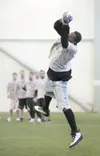 Billy Sewell catches a pass during tryouts for the Arctic
Predators indoor football team Saturday at the Curtis D. Menard
Memorial Sports Center in Wasilla. ROBERT DeBERRY/Frontiersman