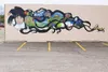This new mural designed by Haley Hohn and painted by Emily Longbrake adorns the back wall of Bishop’s Attic building in Palmer. HEATHER A. RESZ/Frontiersman