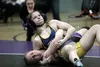 Brynlee Lutz, a Wasilla High freshman, works to pin her opponent during Team Alaska's dual with Team Yukon Tuesday, March 12, 2024, at Teeland Middle School. Jeremiah Bartz/Frontiersman