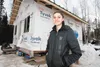 Melissa McGraw stands in front of her new home, which is under construction in the Houston area. Building the small cabin for McGraw and her family was the idea of Burchell High School Princi