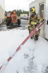 Firefighters assigned to the 673d Civil Engineer Squadron train during the foam test at Hangar 18 on Joint Base Elmendorf-Richardson, Alaska, Aug. 31, 2017. The firefighters were a part of th