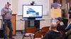 Alaska Railroad Project Manager Tyler Tubbs walks the crowd of about 30, at the Talkeetna Library on Talkeetna Spur Road, through details of the upcoming bridge rehabilitation project in Talk
