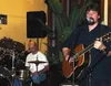 JOHN DAVIDSON/Frontiersman Open mics are attracting plenty of
local talent as they continue to proliferate in the Valley. But
they're also drawing musicians from Anchorage. Guitarist Mike Ols