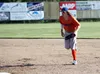 Palmer's Carson McLaughlin makes the play at first during a win against Dimond. The Pioneers scored another home win over Bartlett Sunday. Jeremiah Bartz/Frontiersman