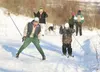 Cross country skiing enthusiast Ed Strabel, left, gives Valley
resident Damien Jessup, 9, some pointers during the 2010 Winter
Trails Day event in the Hatcher Pass area. This year’s event is
