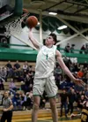Colony’s Patrick McMahon dunks during an overtime win over Dimond. Courtesy of Bruce Eggleston/matsusports.net