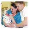 New parents Cara and Grant Hendrickson at Valley Hospital with
baby Addie Lynn -- the first baby born at the hospital in 2003.
Photo by KRISTEN SEINE/For the Frontiersman.