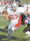 Wasilla wide reciever Tim Orr runs for a gain after a catch
against Chugiak during the first game of the 2008 season. On
Tuesday, the WHS senior signed a National Letter of Intent to play
col