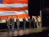 Colony JROTC students present a flag to Priscilla Horner in honor of her late husband Gene Horner. Jacob Mann/For the Frontiersman