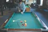 J.D. Halterman breaks a table on the way to winning the
nine-ball intermediate division in the first-annual Iditarod Days
pool tournament. The event is designed to attract top players from
ar
