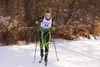Colony High School senior Greta Jenkins strides into the middle track for the finish of Friday's 5-kilometer classic race at Government Peak Recreation Area on day one of the Region III champ
