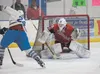 Palmer forward Luke Wright collides with Wasilla defenseman Blake Carricaburu during the Warriors’ 7-0 win Friday night at the MTA Events Center in Palmer. ROBERT DeBERRY/Frontiersman.com