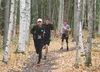 (Left to right) Matias Saari, Ben Marvin of Palmer and Cody Priest, a Palmer High grad, run on the University of Alaska Fairbanks trail system during the Equinox Marathon, Ultramarathon and R