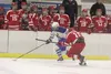 Palmer's Nathaniel Savel tries to skate past Wasilla's Porter Schachle during Palmer's 6-5 overtime win over the Warriors in the semifinal round of the Big Lake Lions Christmas Classic Dec. 1