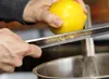 A rasp creates a very finely grated lemon zest. Photo by Debby Wolvos.